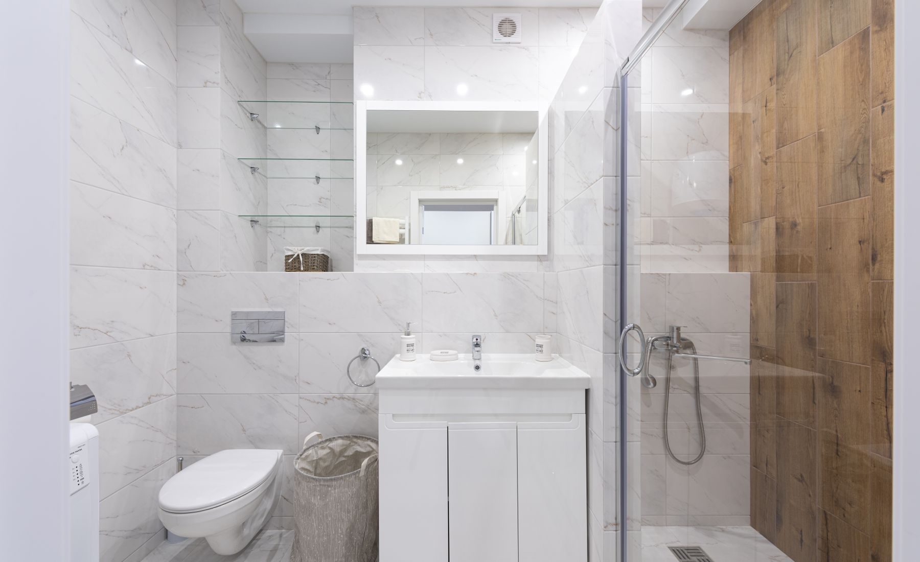 Walk-in shower with marble-look tile