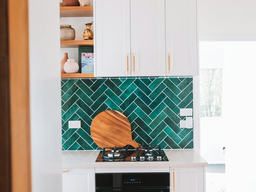 Green herringbone backsplash